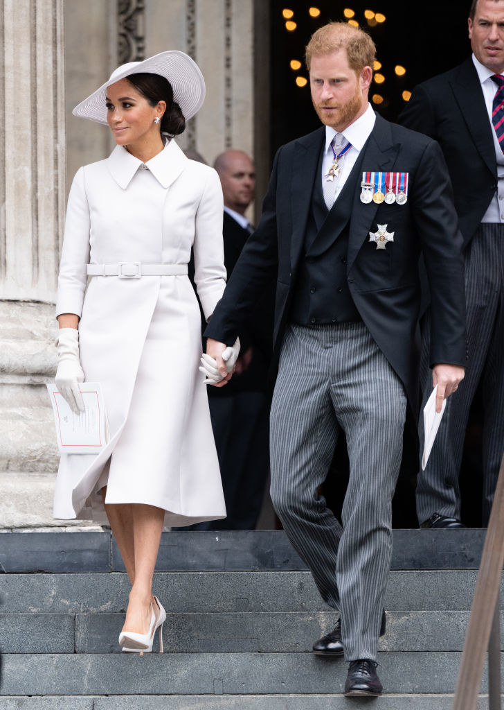 Harry and Meghan leaving a royal event