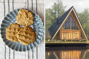 A plate of peanut butter cookies and a small cottage by a lake