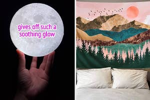 reviewer holding a lit moon lamp in the dark with text: gives off such a soothing glow / a colorful tapestry depicting a mountain and forest scene