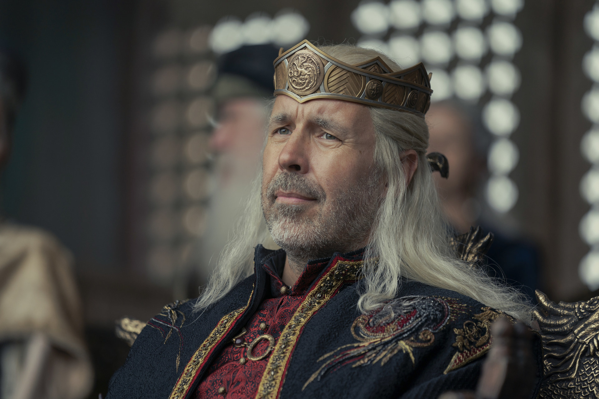 Viserys Targaryen frowns while wearing his crown