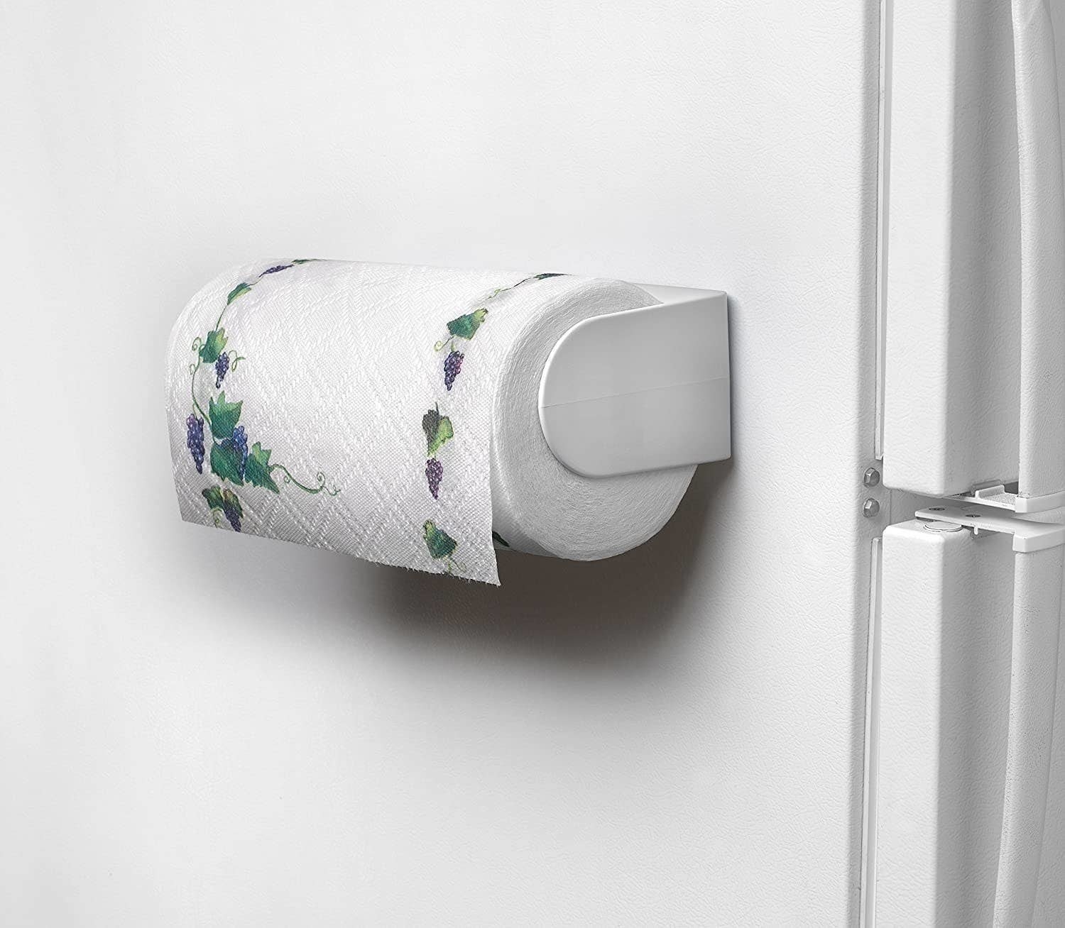 a magnetic paper towel holder holding a roll of paper towel