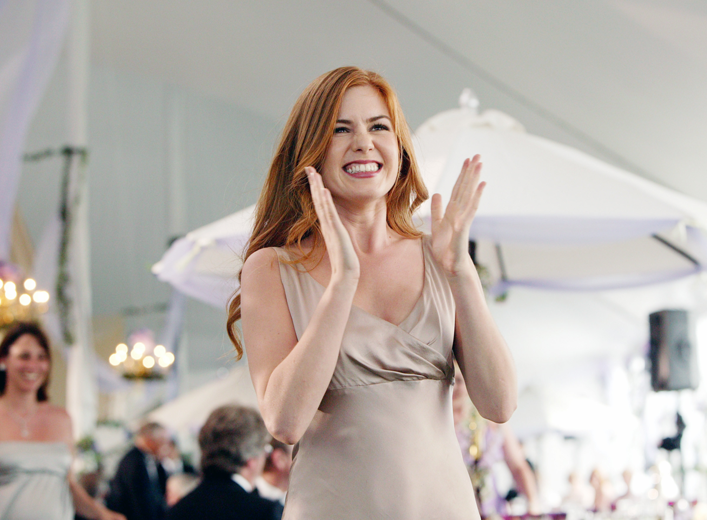 Gloria clapping at a wedding