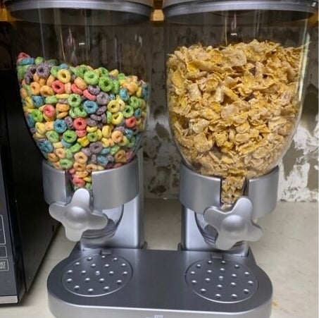 the cereal dispenser filled with lucky charms and fruitloops 
