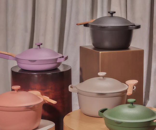 Various colors of the Always Pan and the Perfect Pot sitting together