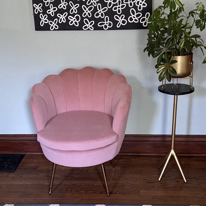 a reviewer photo of the pink chair