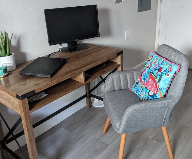 a reviewer photo of the wooden desk