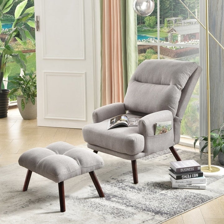 a gray recliner and matching ottoman