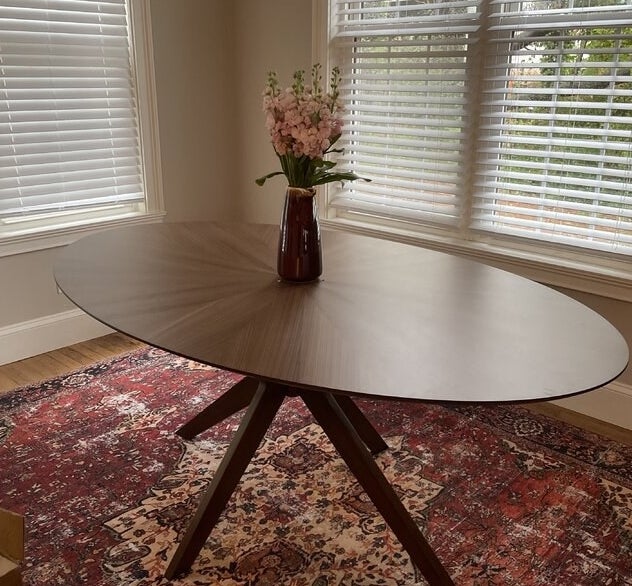 a reviewer photo of the walnut table