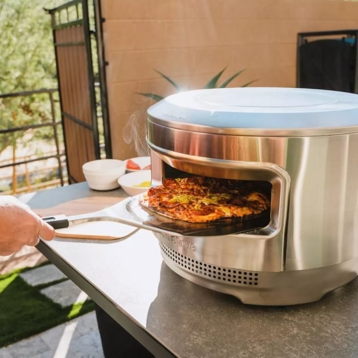 a model using the stainless steel oven outdoors