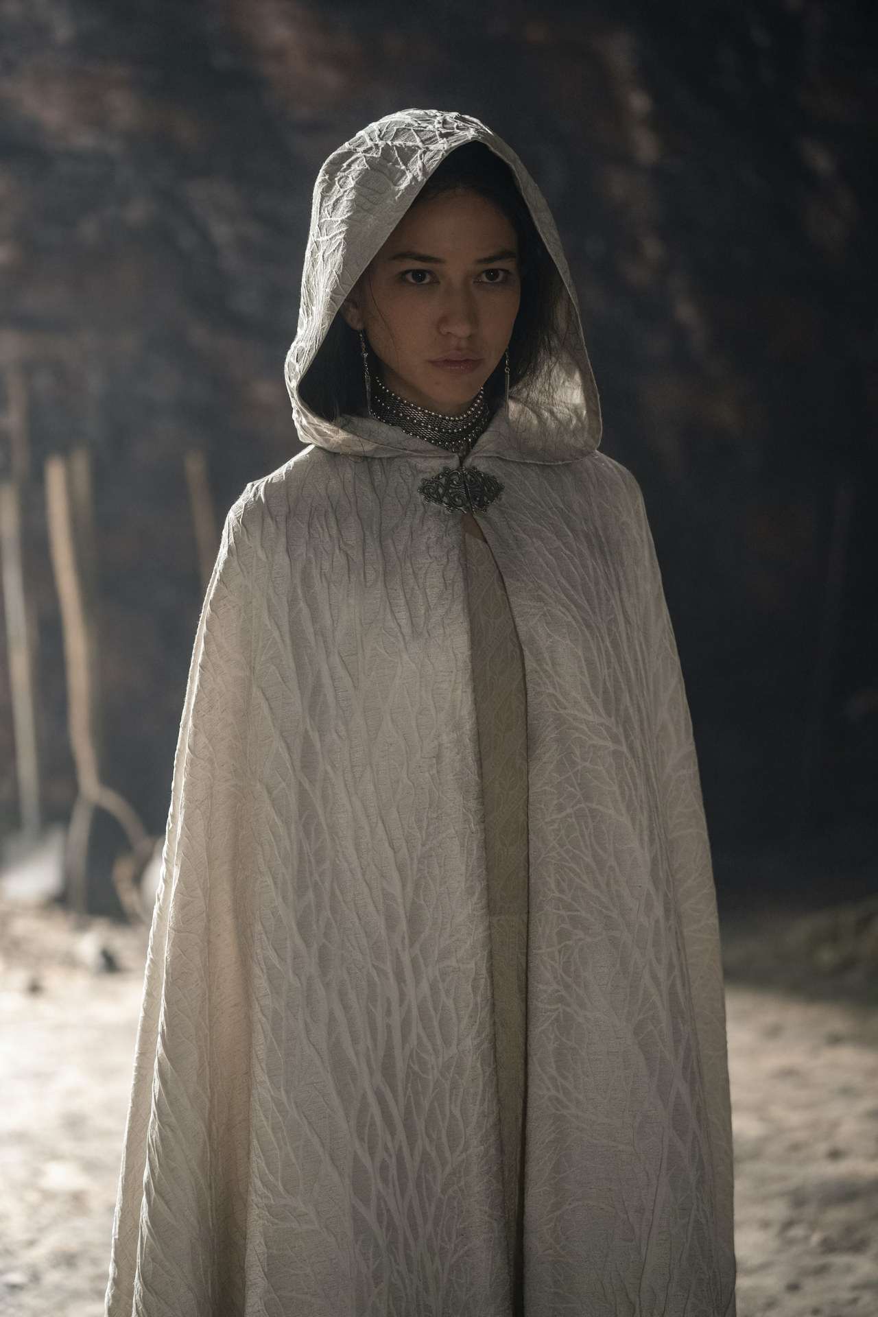 Mysaria wears a pale cloak