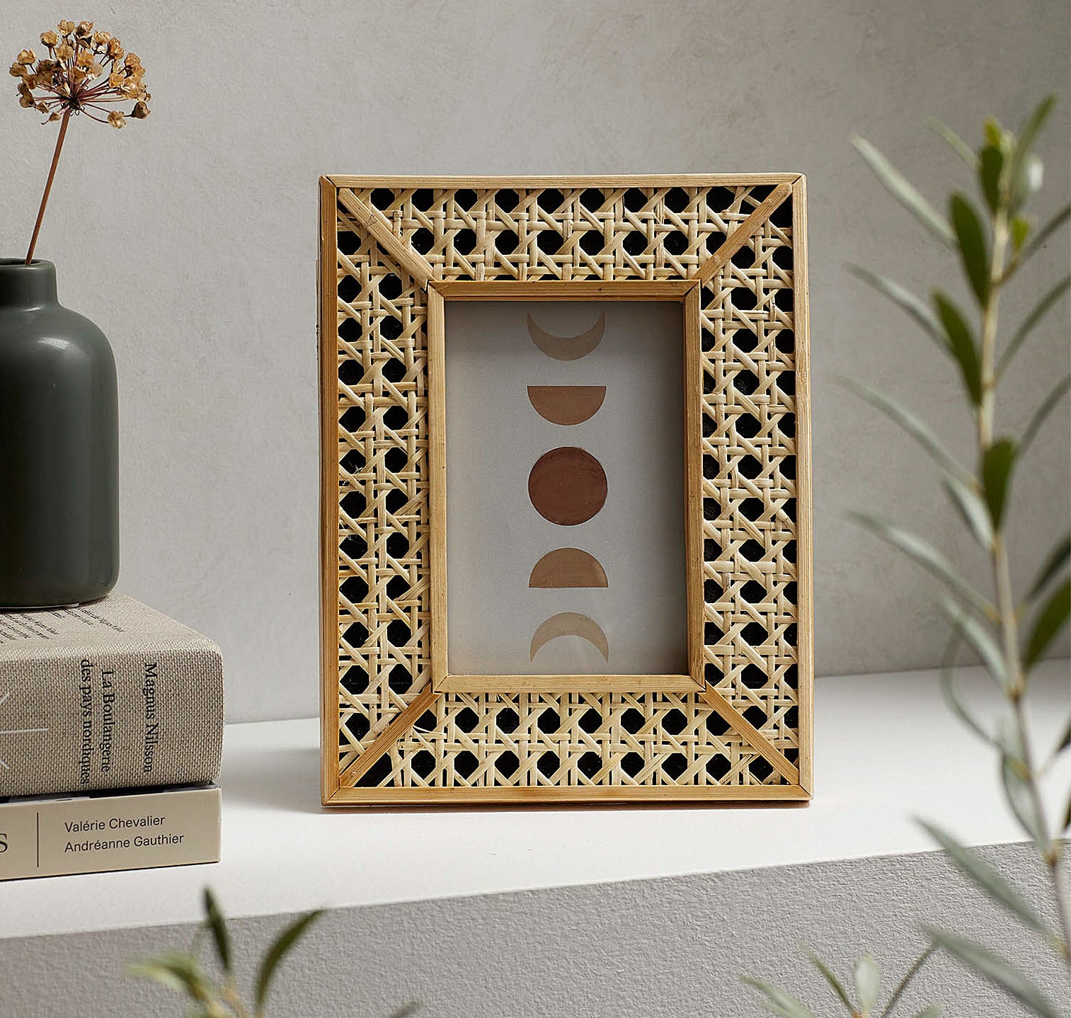 The picture frame on a shelf