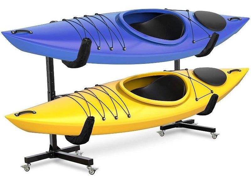 a blue and yellow kayak being supported by a kayak rack