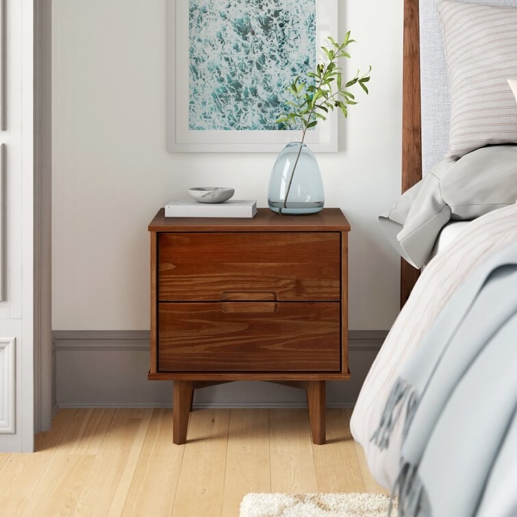 walnut bedside table with two drawers and midcentury legs