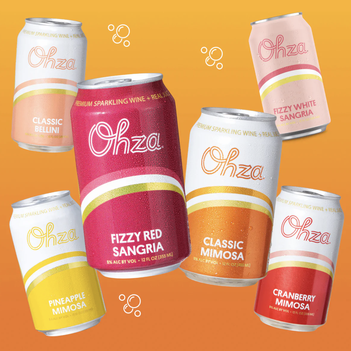 colorful cans of Ohza pineapple mimosa, fizzy red sangria, and cranberry mimosa