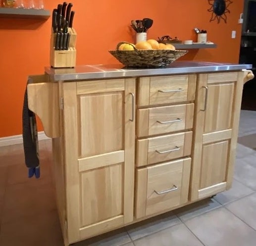 A reviewer photo of the wood kitchen island