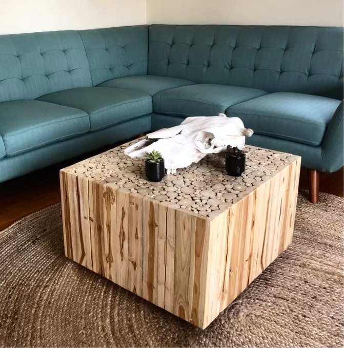 A reviewer&#x27;s image of the block coffee table in natural wash