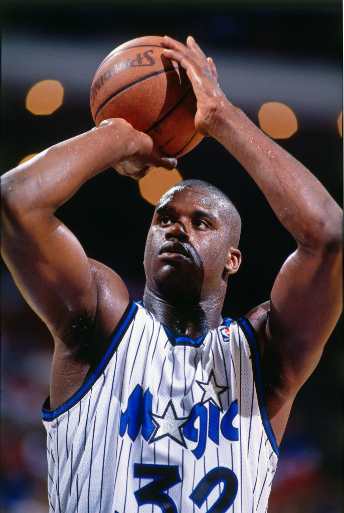 Shaq about to take a shot with a basketball