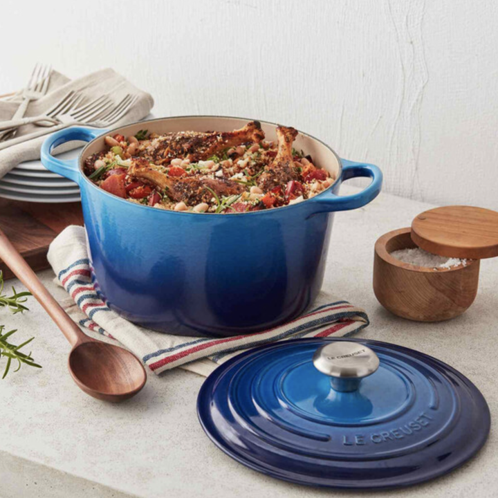 blue Le Creuset Dutch Oven filled with veggie stew