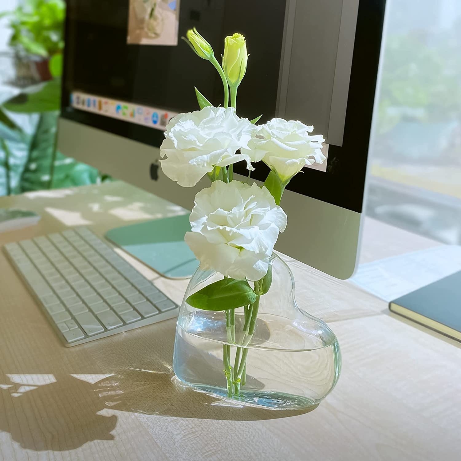 A bouquet in a vase on a desk
