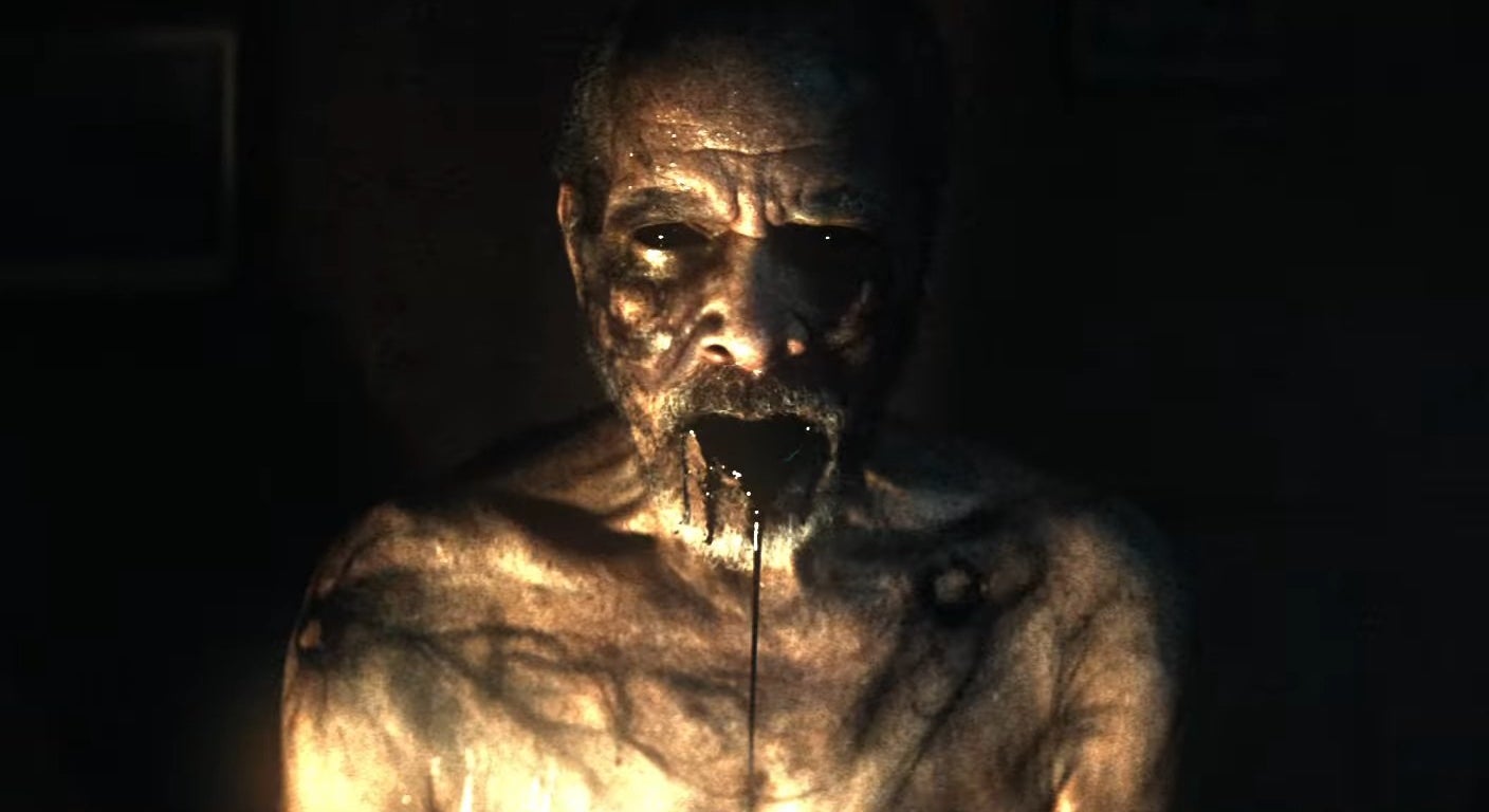 An old man with black saliva pouring from his mouth in &quot;It Comes at Night&quot;