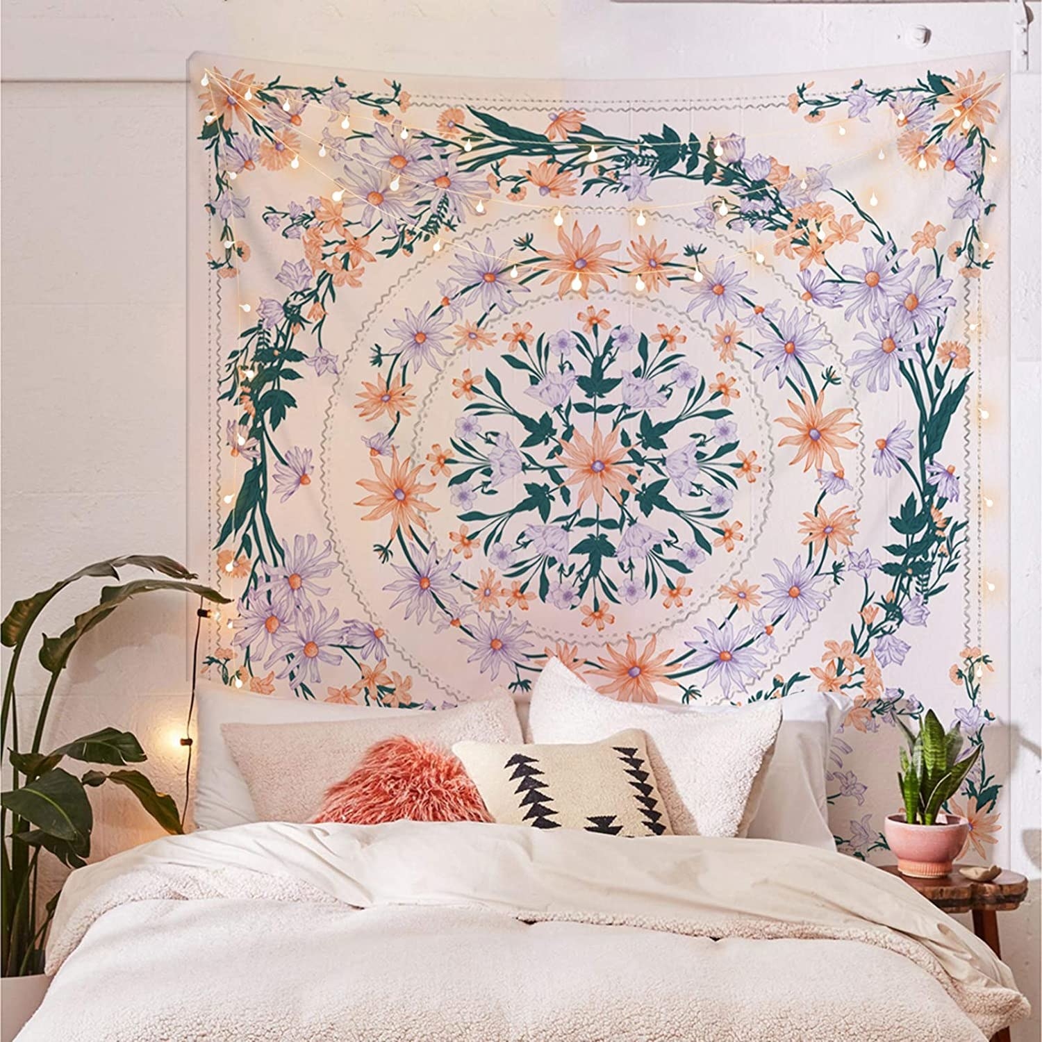 The tapestry behind a bed in a bedroom