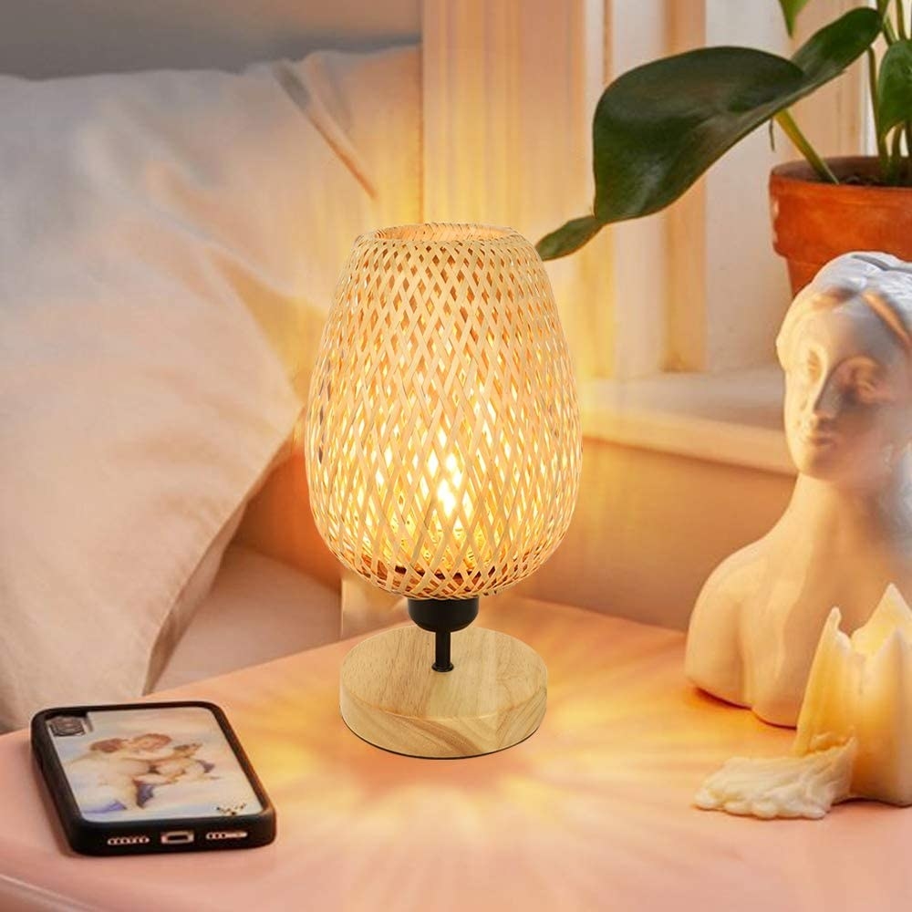the rattan lamp on a bedside table