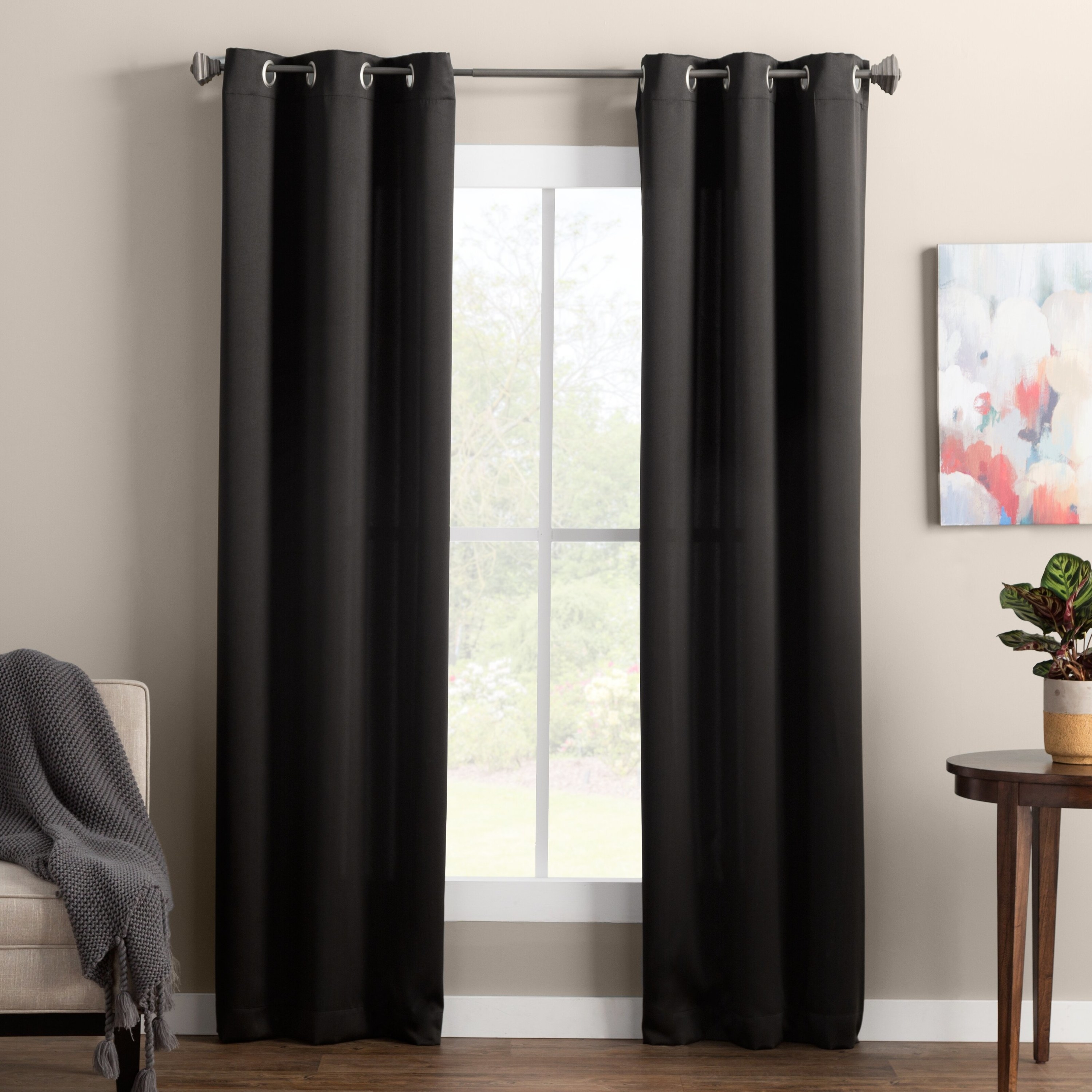 the black curtain panels