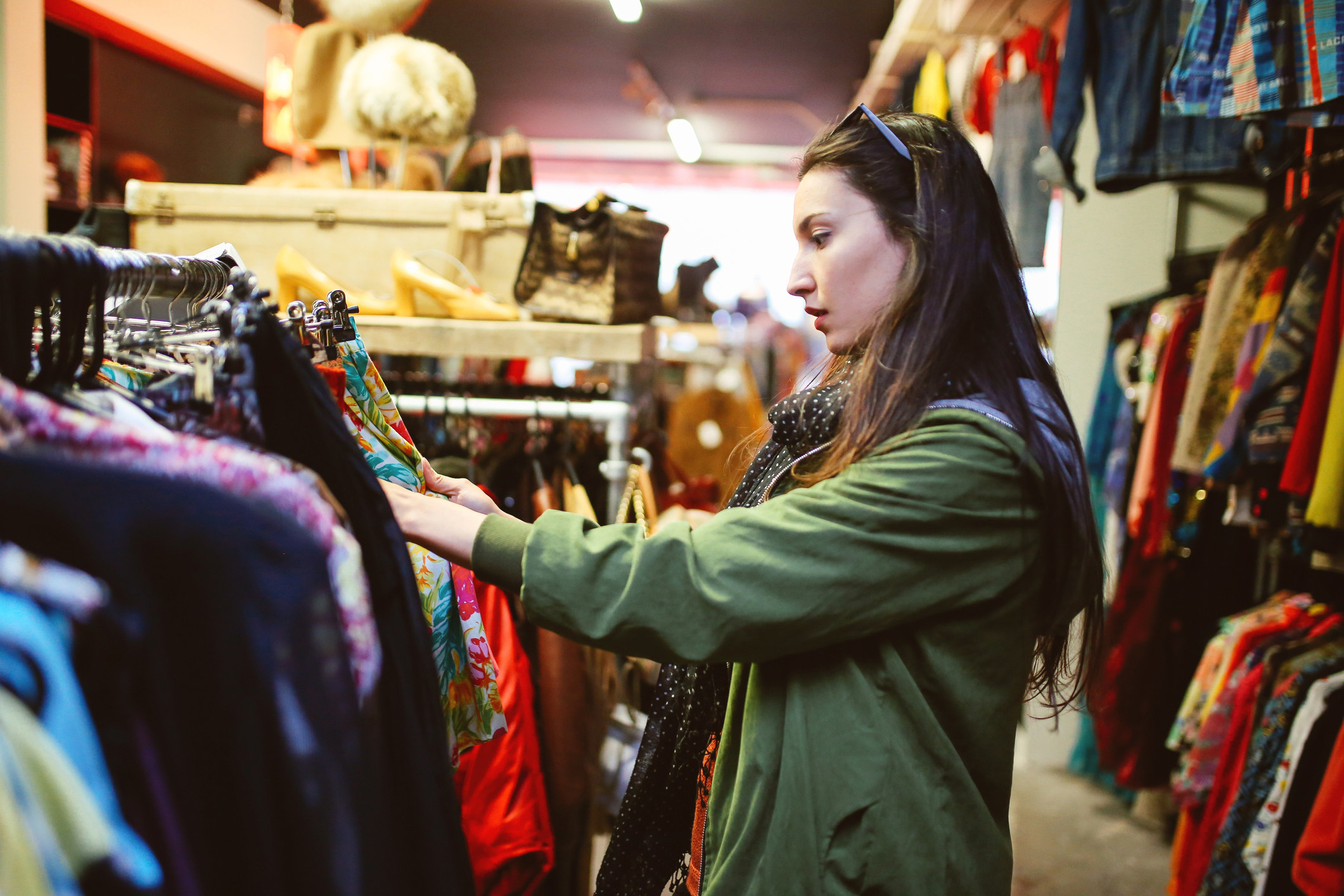 A woman shopping at a thrift store