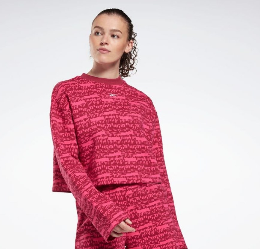 A model wearing a pink printed long sleeve
