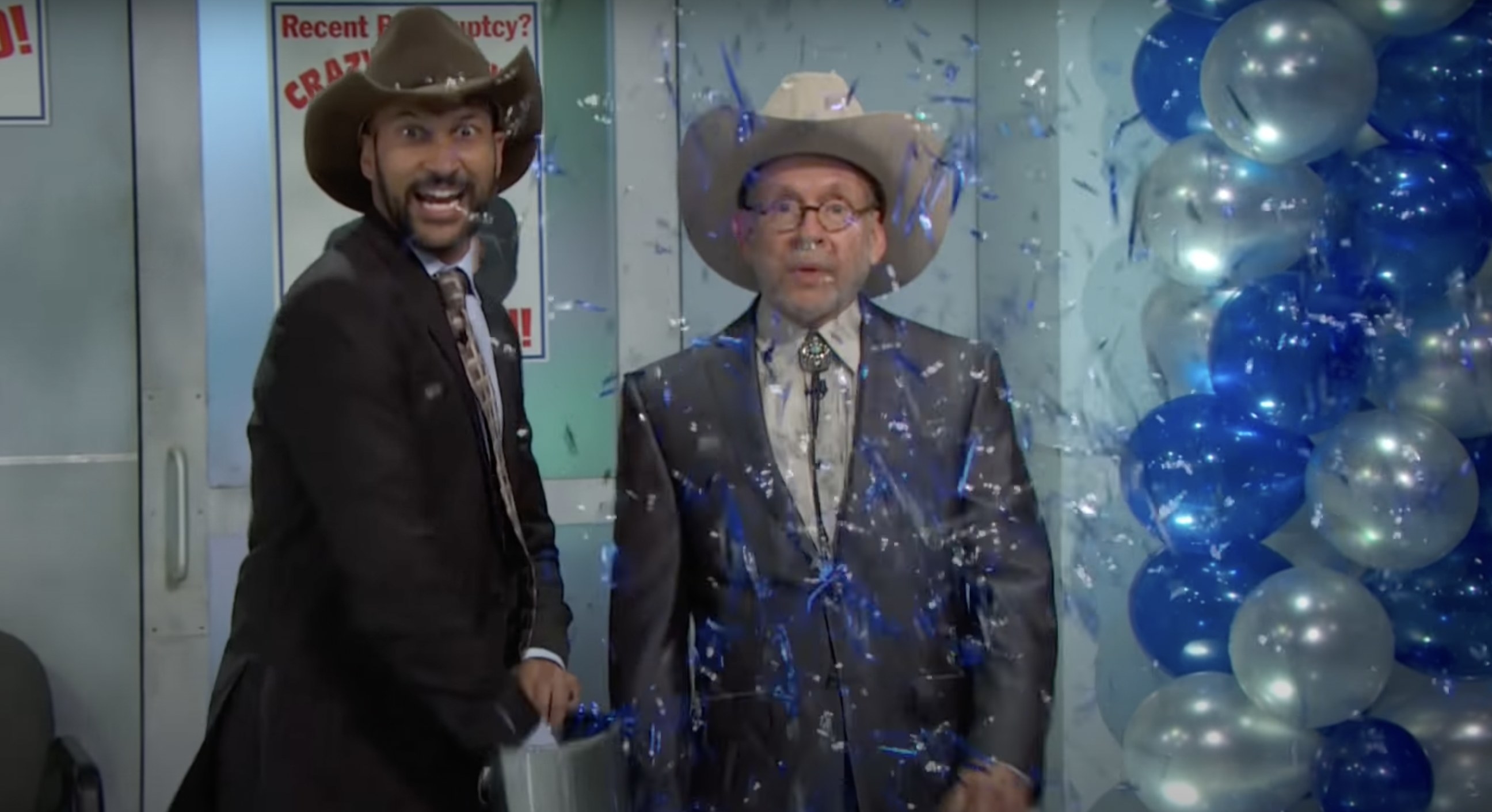Keegan Michael Key and Bob Balaban in cowboy hats, with Key throwing confetti
