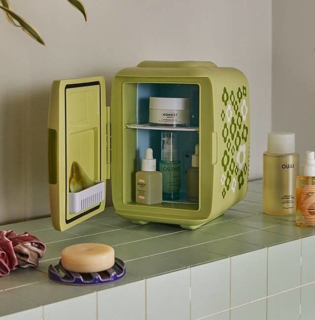 a patterned skincare fridge on a counter