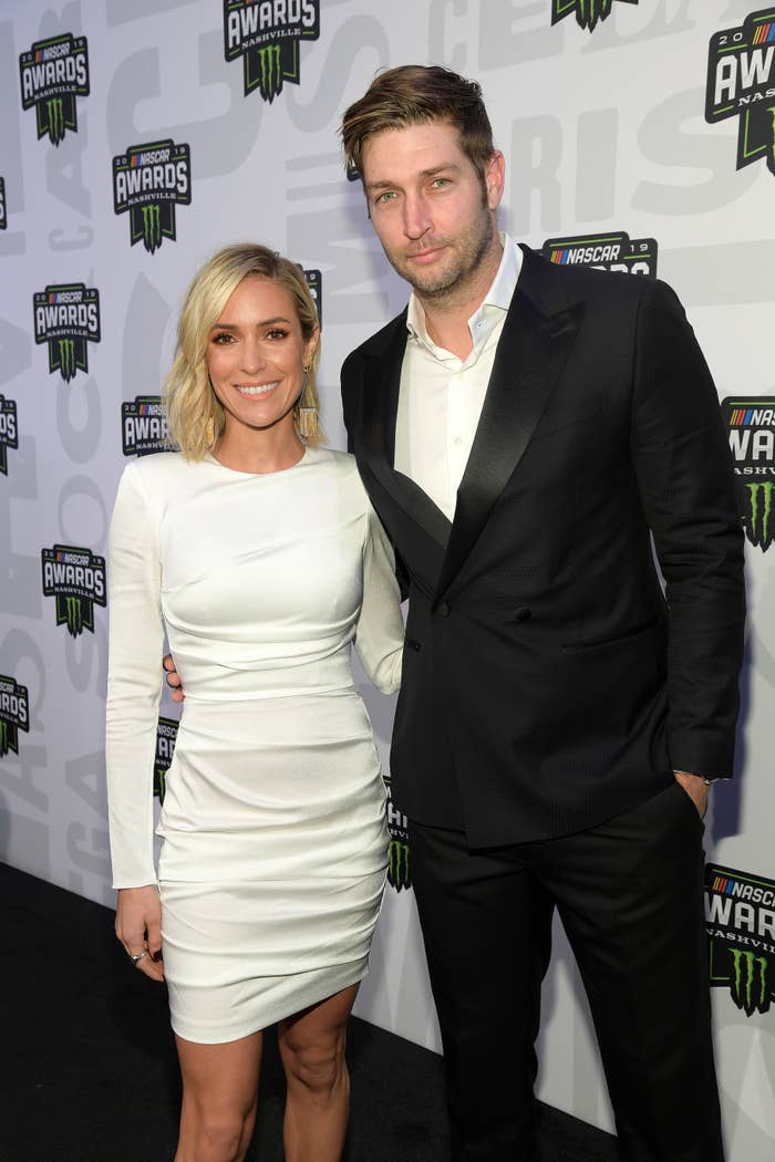 Kristin and Jay pose for a photo at an awards show
