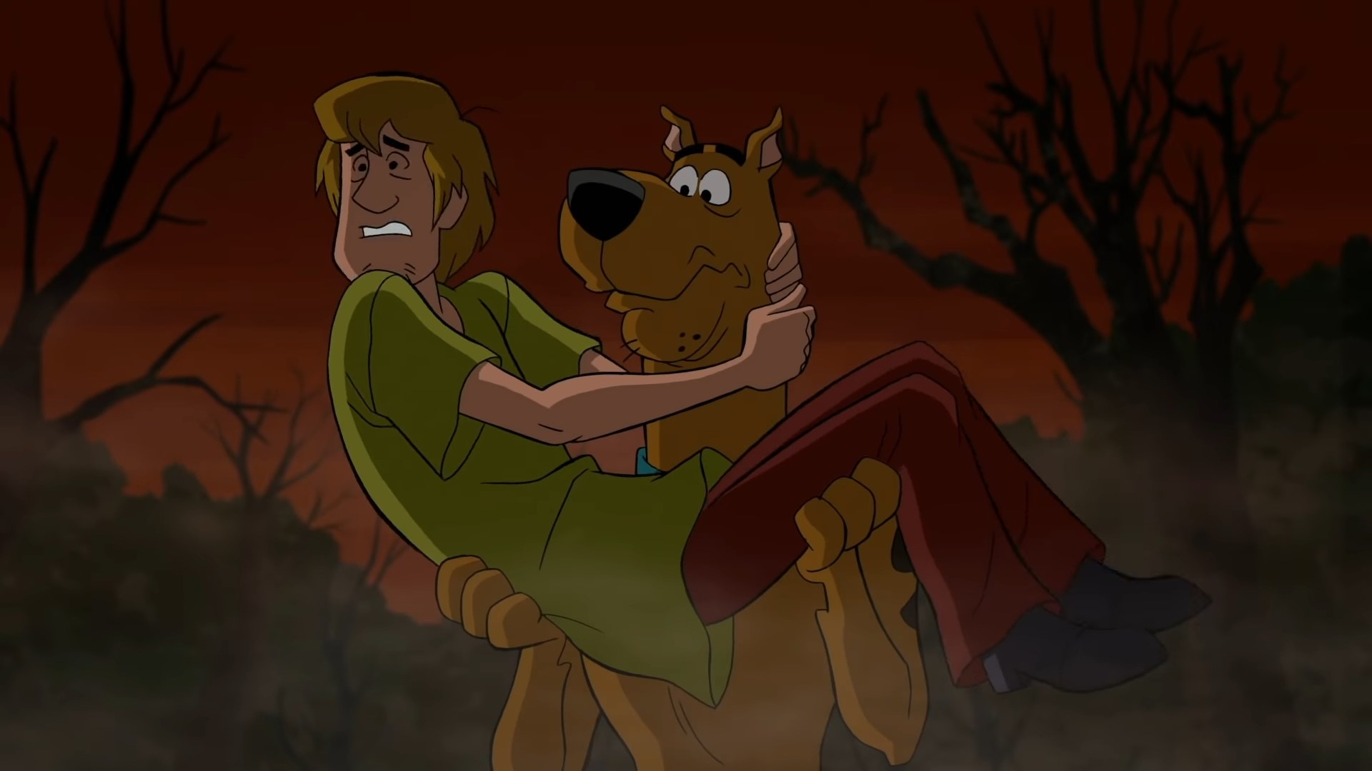 Scooby-Doo holding Shaggy in his arms