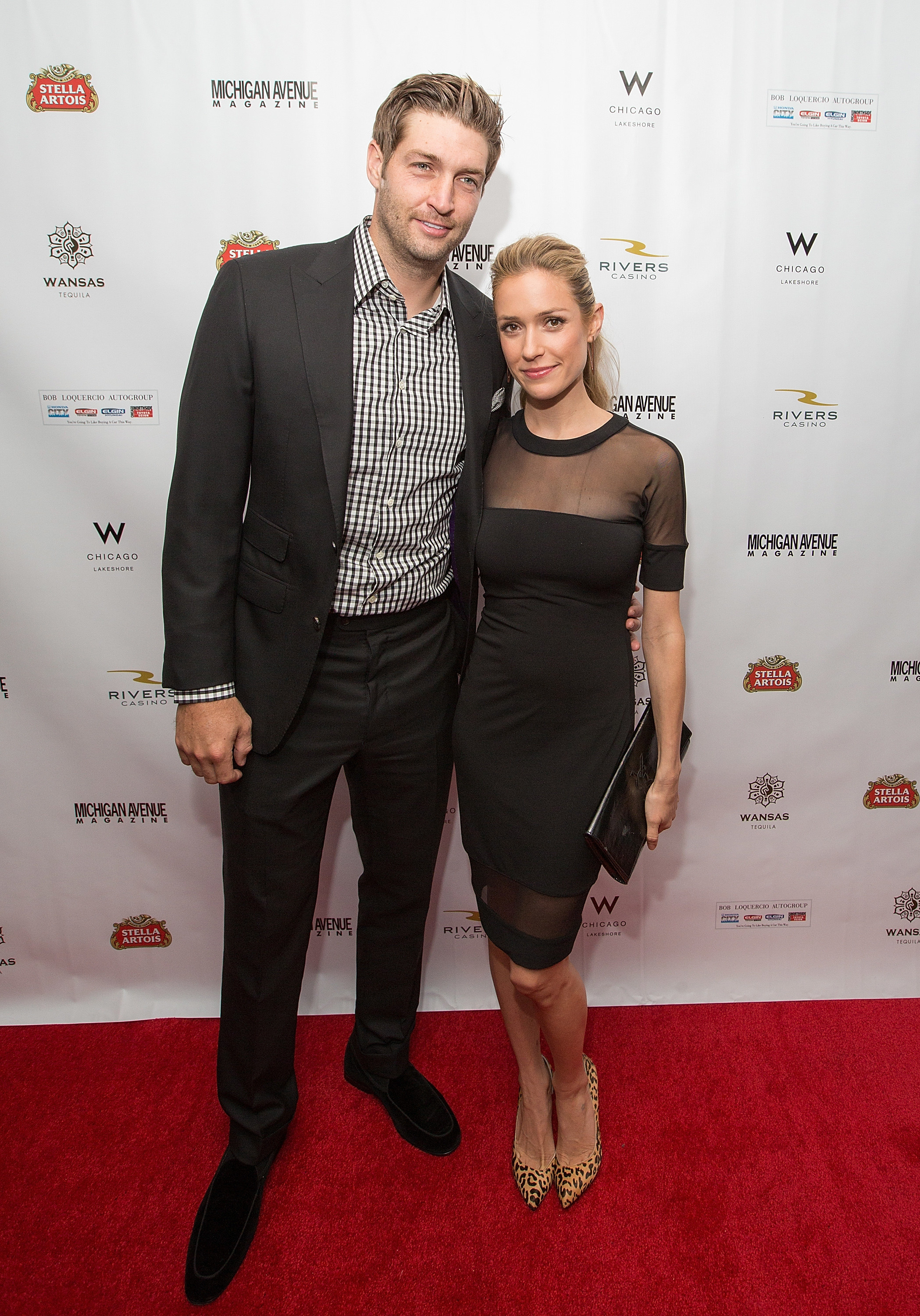 Jay and Kristin standing together on the red carpet