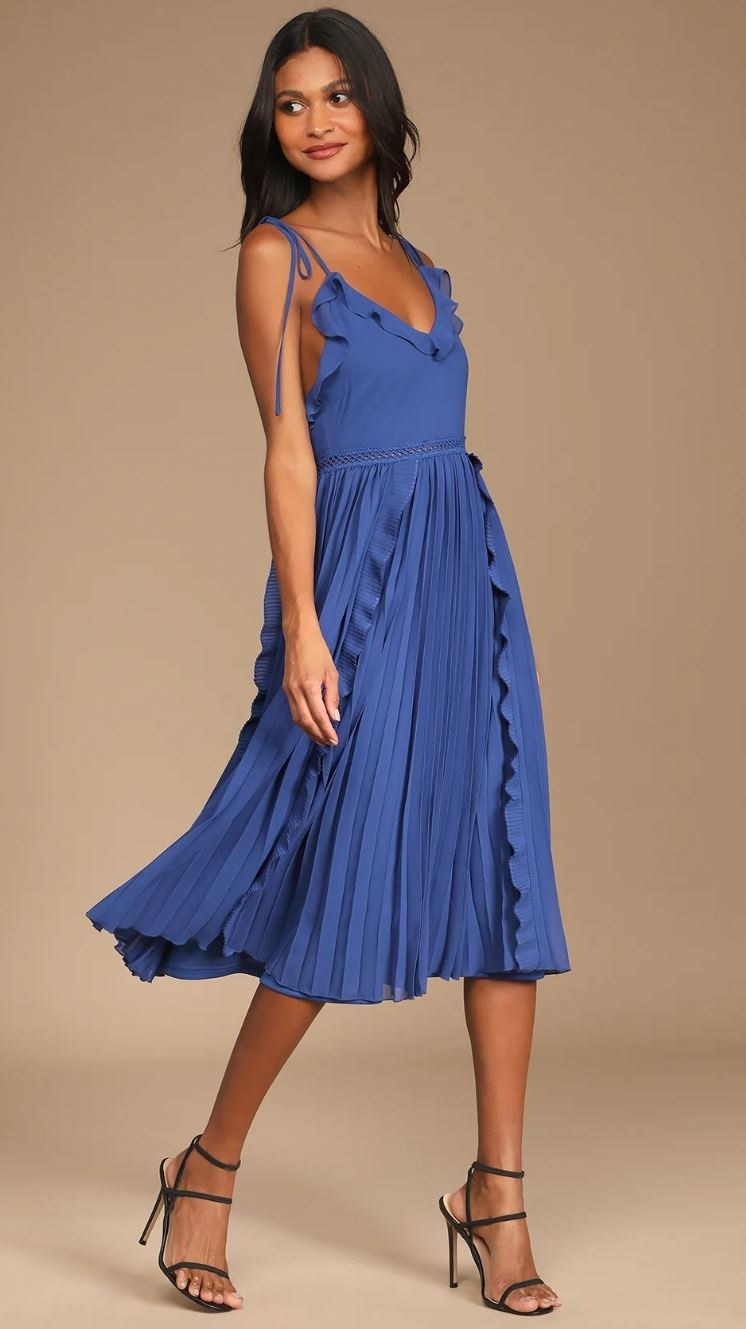 model wearing royal blue tie-strap dress