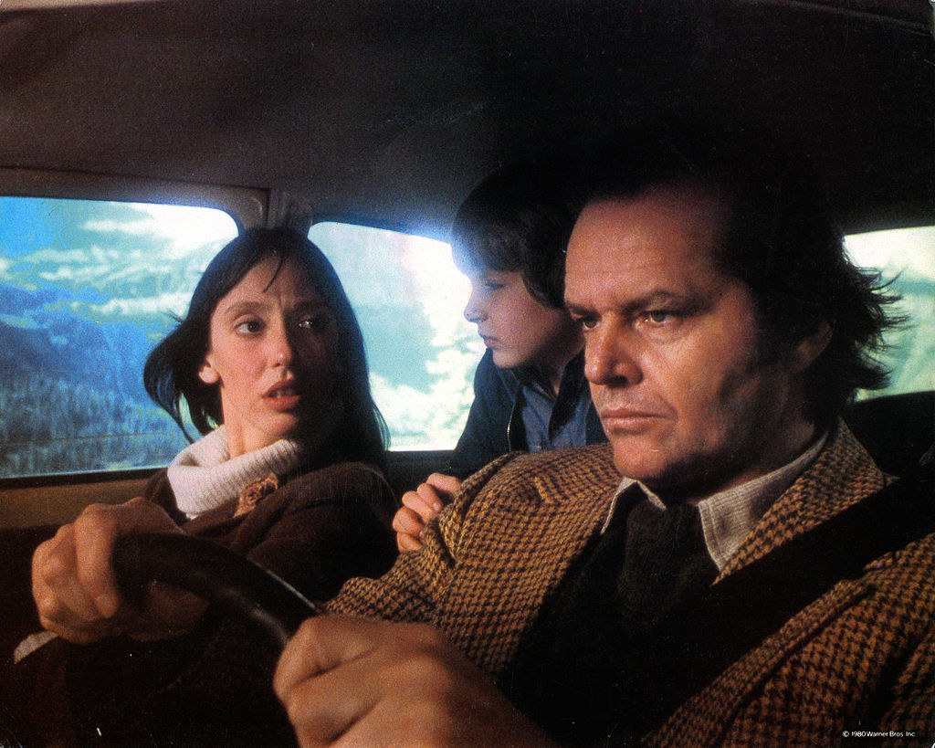Shelley, Danny, and Jack Nicholson in a car on their way to the Overlook hotel
