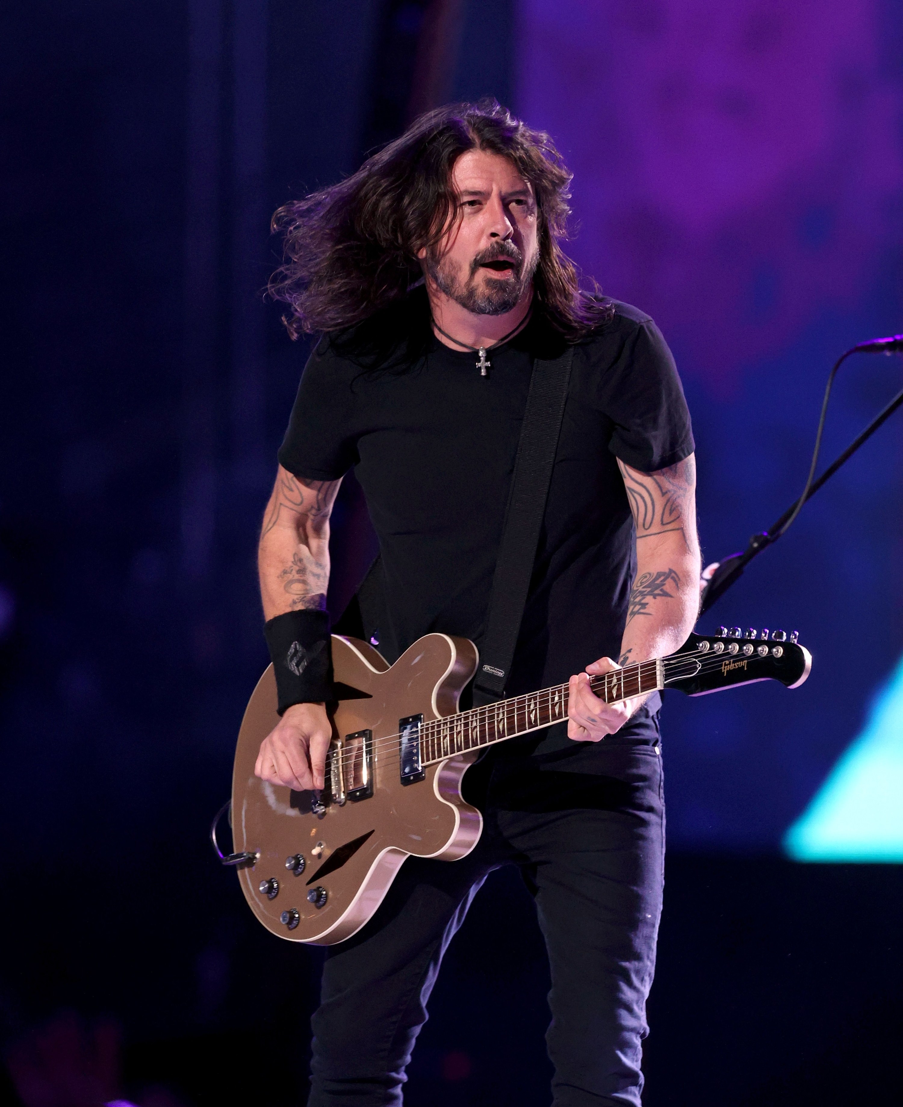 Dave Grohl on stage playing his guitar