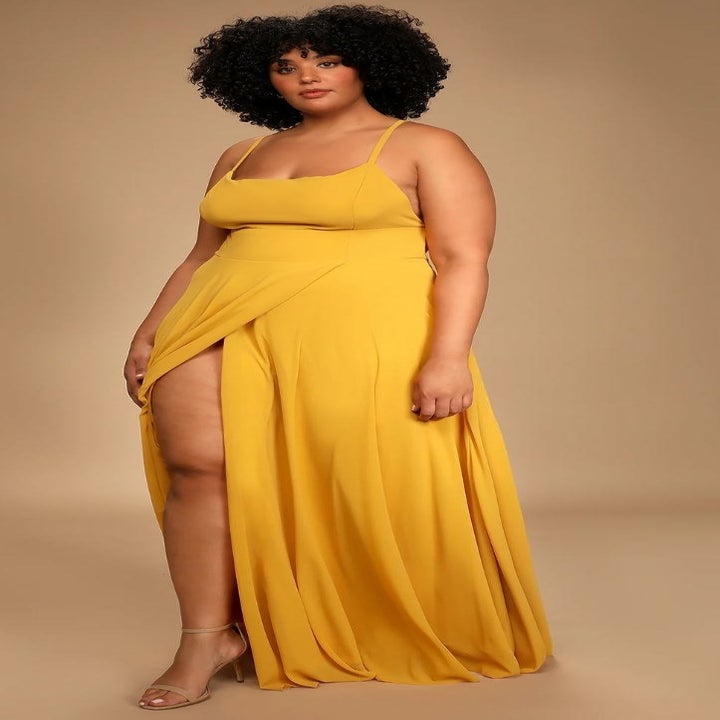 model wearing yellow maxi dress