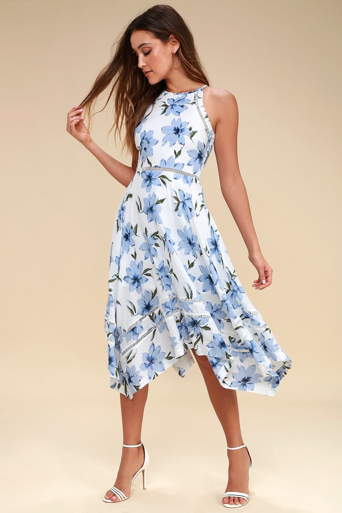 model wearing blue floral midi dress