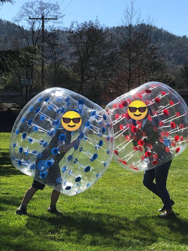 reviewer image of two teens inside their own bumper balls