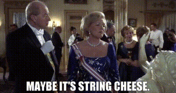Woman saying, &quot;Maybe it&#x27;s string cheese.&quot;