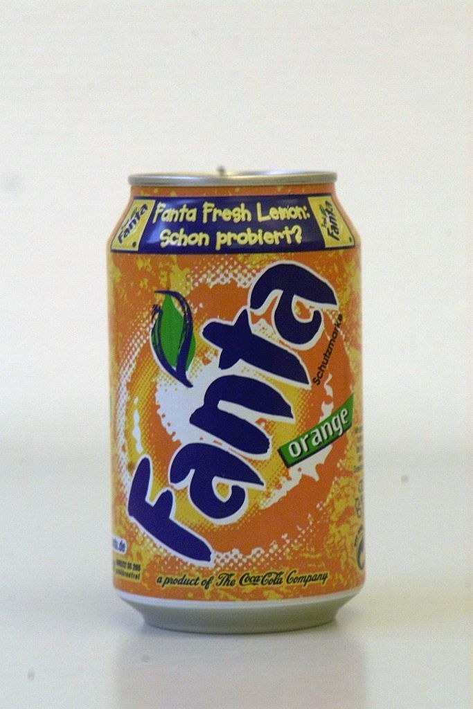 A can of orange Fanta soda.