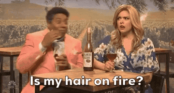 Woman saying, &quot;Is my hair on fire?&quot;