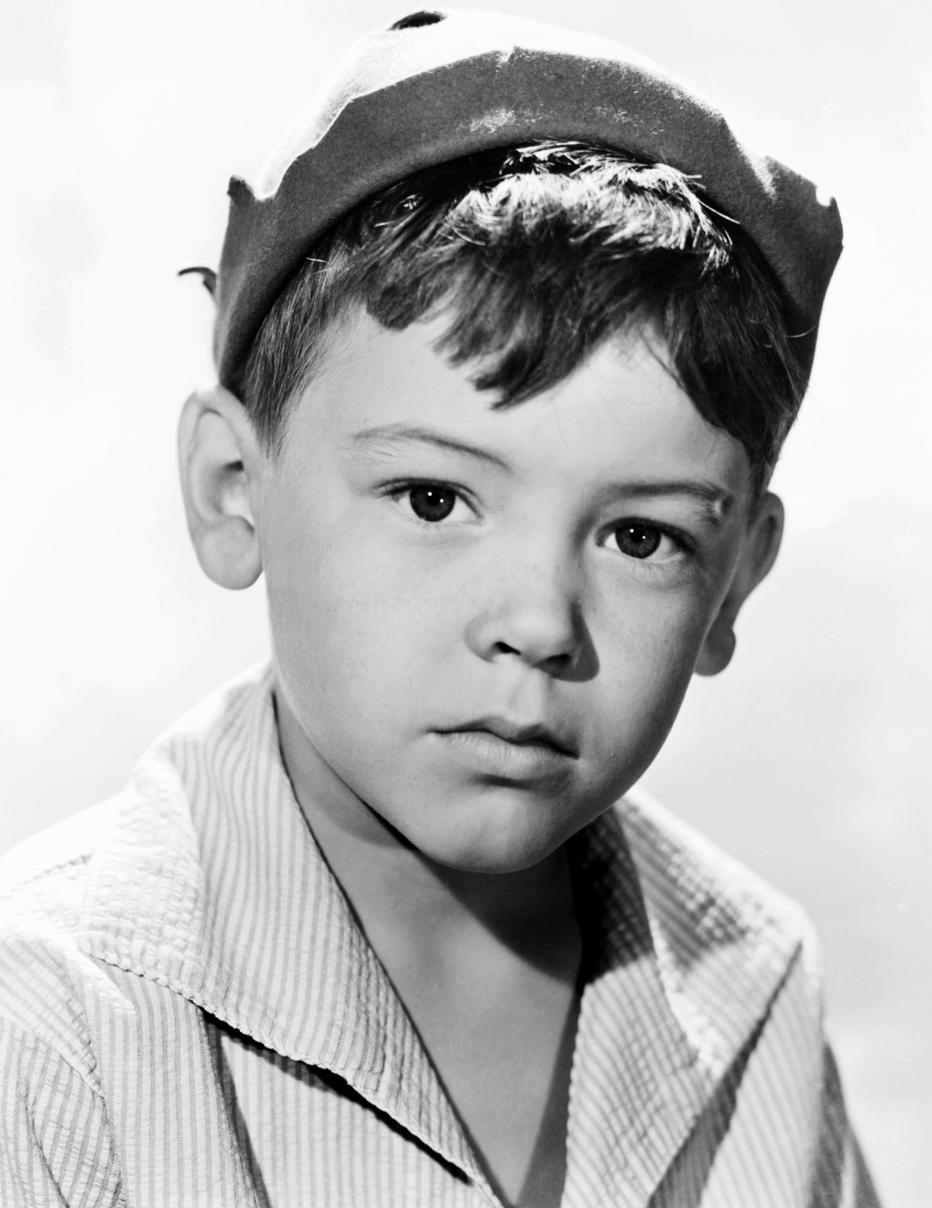 Black-and-white headshot of Bobby