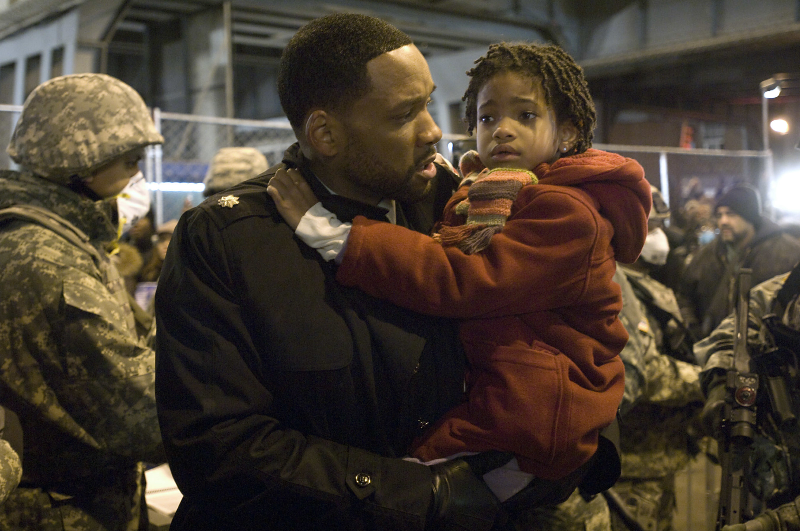 Willow as a child being held by her father, Will Smith