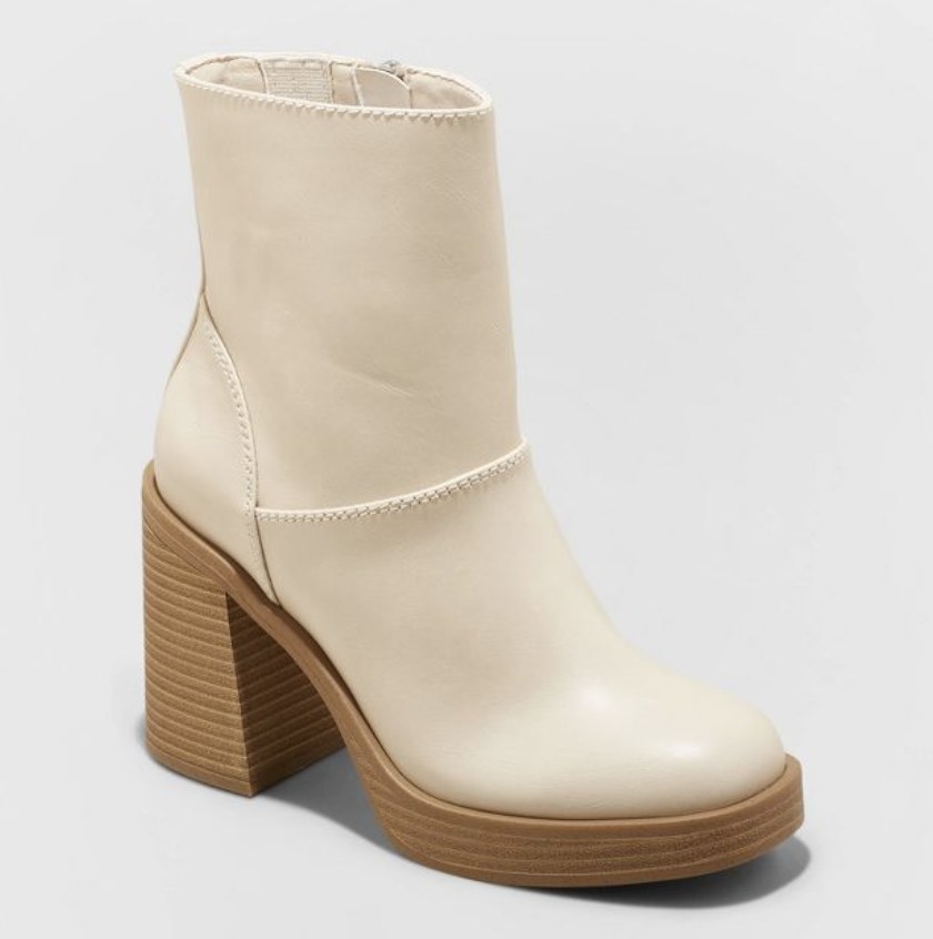 The white platform boots have a light brown sole