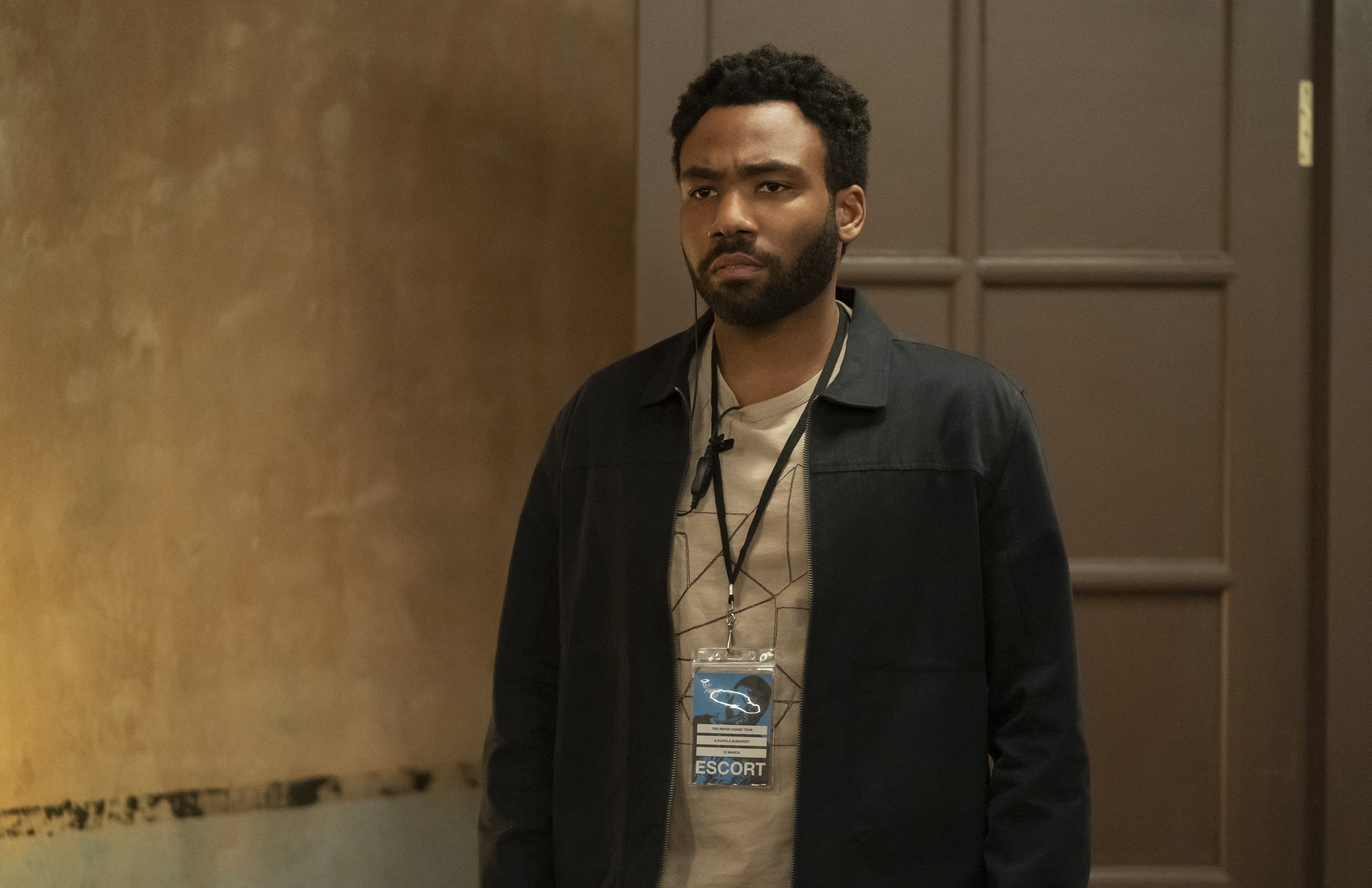 Donald Glover looking serious in a scene from the show