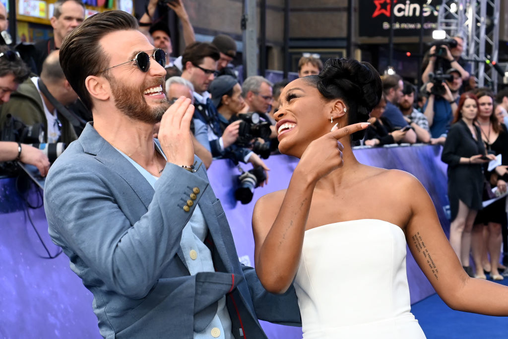 Chris and Keke laughing at an event