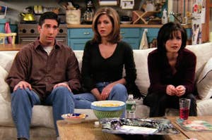 Ross, Rachel, and Monica from Friends sitting on the couch