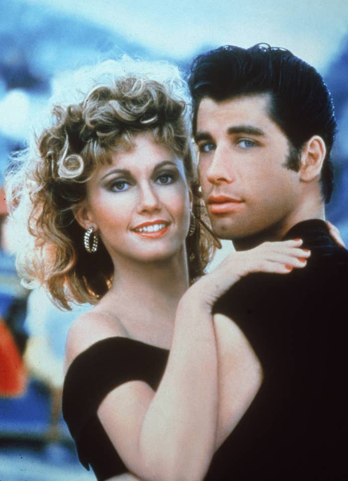 Olivia Newton John and John Travolta posing for a promotional picture for Grease